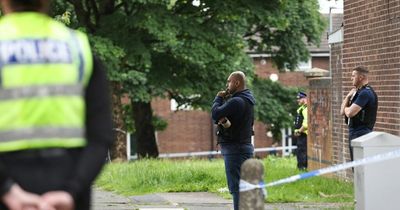 Man arrested after police spend NINE hours in tense roof standoff