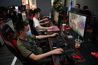 China approves 60 new games, lifting hopes tech crackdown is ending