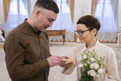These Russian couples didn't plan to get married. The Ukraine war changed their minds