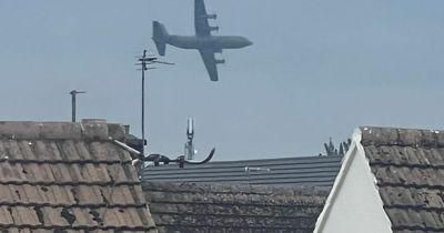 Two huge RAF aircraft seen flying low over Welsh coast