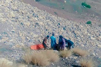 Bus falls into deep ravine in southwest Pakistan, killing 22
