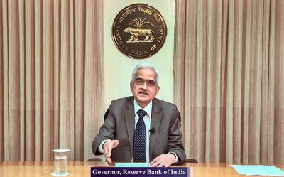 RBI Governor bats for cut in State taxes on petrol, diesel