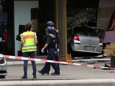 A car drove into a crowd in Berlin, killing 1 person, police say