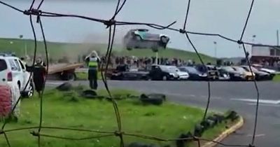 Incredible footage shows charity car stunt gone wrong that left hero driver with broken back