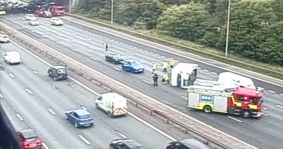 Traffic backed up on M6 after van flips over after crash