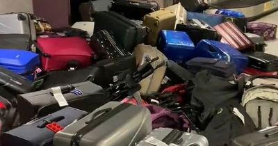 Heaps of luggage seen piling up at carousel in Manchester Airport