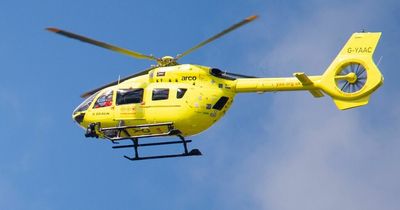 Man trapped after falling from Leeds building as air ambulance lands
