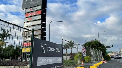 Toombul retailers left without insurance call for compensation from Mirvac as developer offers cash payment