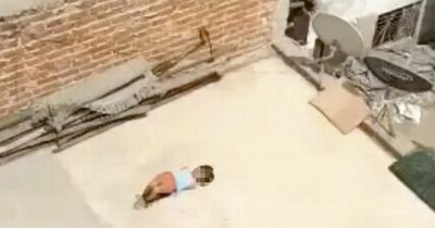 Mum ties up daughter, 5, and leaves her on roof in 42C for 'not finishing her homework'