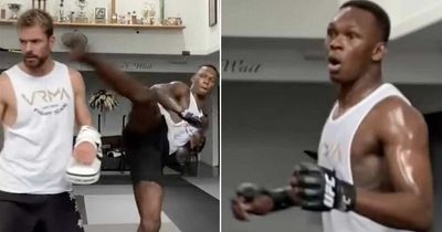 Israel Adesanya apologises after almost knocking out coach with head kick