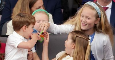 Princess Charlotte lays down the law as she slaps Louis' hand out of his mouth