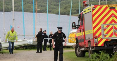 Two missing after boat capsizes with rescued adult fighting for their life