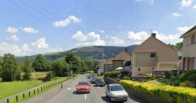 Man detained after armed police respond to incident on residential street