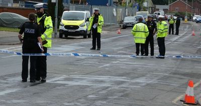 Car and motorbike crash as roads closed by police