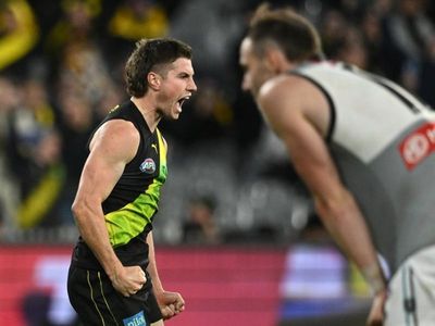 Baker's brilliance leads Tigers to AFL win