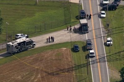 Maryland mass shooting - live: Three dead as video appears to show police exchange fire with suspect