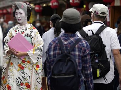 Japan eases foreign tourism ban and allows guided package tours