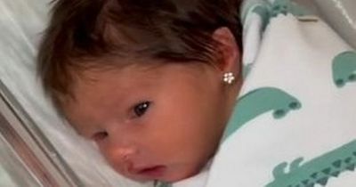 Mum criticised for piercing newborn baby girl's ears at two days old