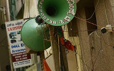 Which law allows grant of permanent licence for using loudspeakers, HC asks government