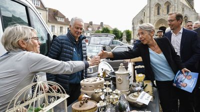 Macron faces tough vote in France's closely fought parliamentary polls