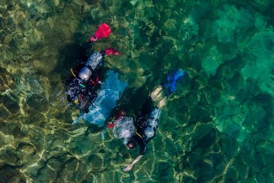 Israeli divers haul trash from ancient site for Oceans Day