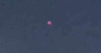 UFO captured in film footage as planes 'prevented from landing' at nearby airport