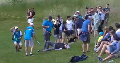 Golf fan dramatically hits the deck after being struck by ball at controversial LIV event