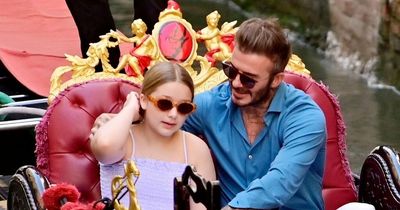David Beckham cuddles daughter Harper during traditional gondola ride on Venice getaway