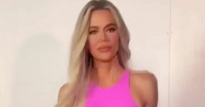 Khloe Kardashian looks slimmer than ever as she rocks daring skin-tight pink ensemble