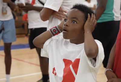 Zion Williamson blew the mind of an adorable kid at his basketball camp with a casual tomahawk dunk