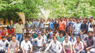 As workers go on strike, waste piles up on road in Noida