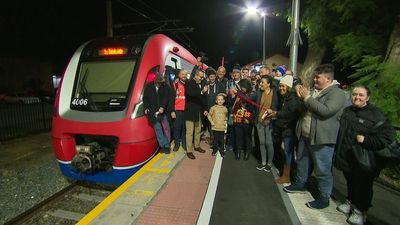 Adelaide train line back in action, amid claims ending transport privatisation deal could cost taxpayers $70m