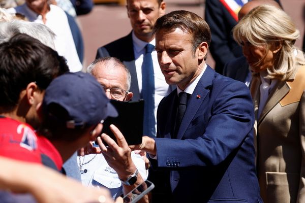 Macron faces tough battle for control of parliament after first round vote