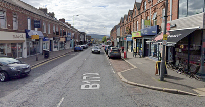 Man armed with large kitchen knife robs Belfast shop