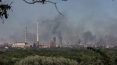 Russia Destroys Bridge over Ukrainian River, Cutting Escape Route