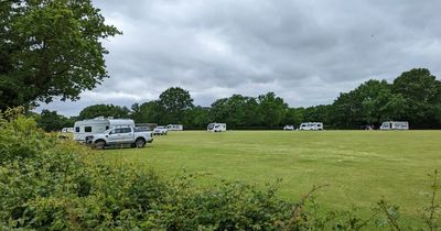 Travellers who pitched up on school's football field served with notice