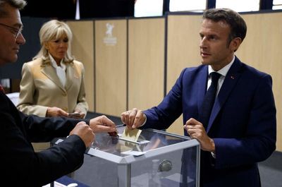 French election: Macron’s centrists expected to keep parliamentary majority after first round of voting