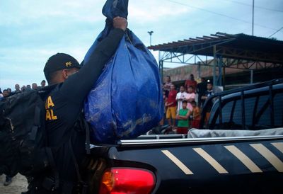 Belongings of missing men found tied underwater in Amazon