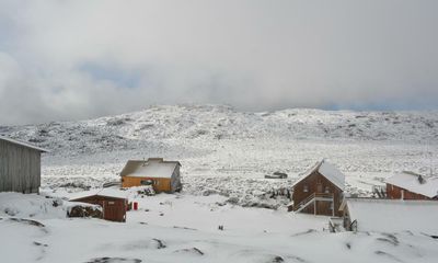 Antarctic blast brings heavy snowfalls and huge swells to Australia’s south-east