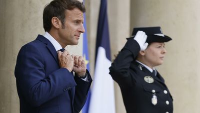 Macron's alliance holds thin majority in legislative polls, as left-wing alleges irregularities