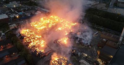 Watch drone footage of huge fire as thousands of tons of paper and cardboard burns