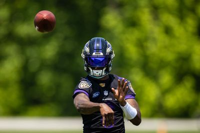 Baltimore Ravens quarterback Lamar Jackson reports to minicamp