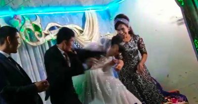 Groom from hell punches bride after he loses game at wedding in horror clip