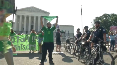 Pro-choice protesters blockade intersections near the Supreme Court ahead of Roe v Wade abortion ruling