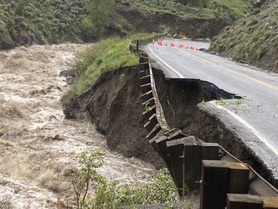 Flooding at Yellowstone National Park sweeps away a bridge and washes out roads
