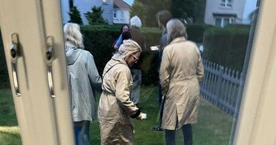 Scots woman confused after finding eight Americans in her front garden waving through window
