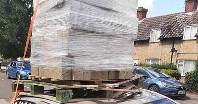 Car that had nothing right with it stopped for carrying bricks on its roof