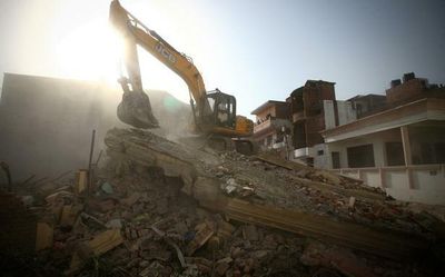 After bulldozing home of violence 'mastermind', authorities mull action against others on list