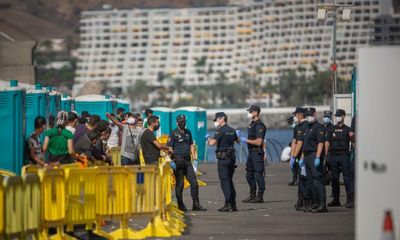 Photographer capturing migrant camp fined €1,000 under Spain’s ‘gag law’