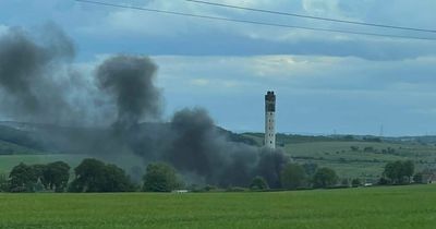 Firefighters raced to blaze ripping through Scots industrial plant as smoke billows into air